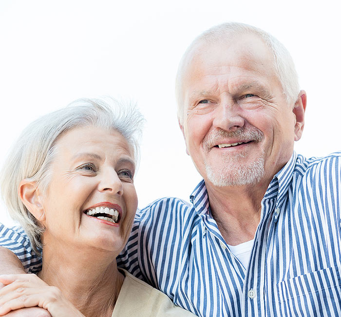 An older couple smiling together